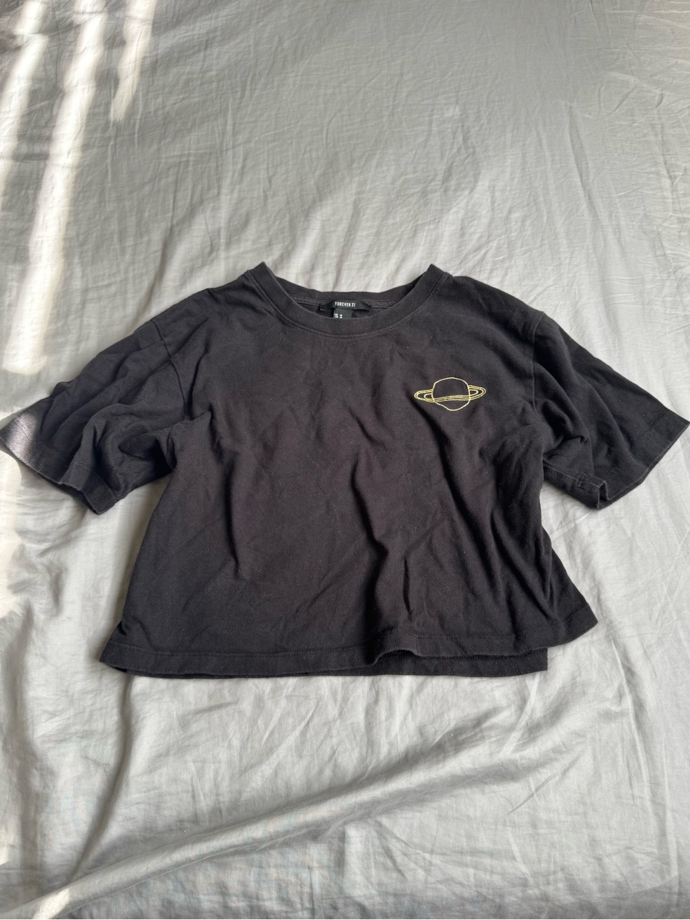 Forever 21 Black Cropped Tee with Gold Planet Patch